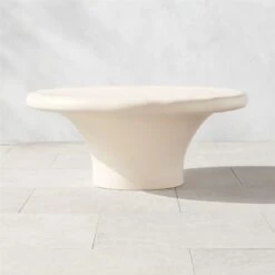 Pompeo Round Ivory Cast Resin Outdoor Coffee Table Large